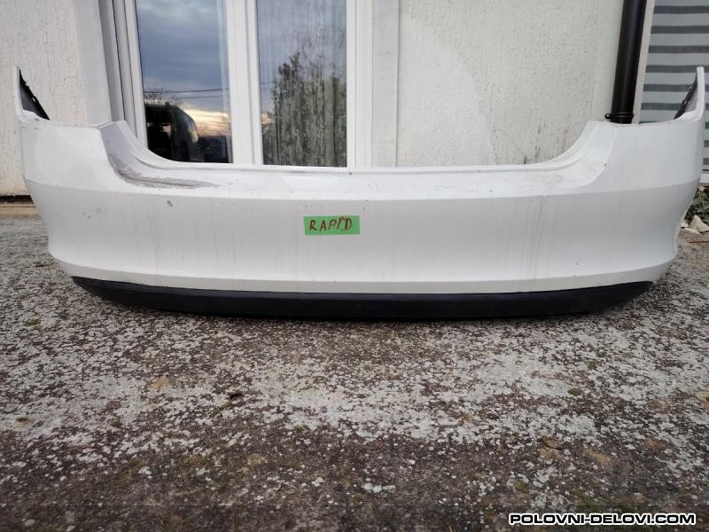 Zadnji Branik Sa Difuzorom Skoda Rapid ORIGINAL 